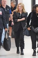 KYLIE MINOGUE Arrives Back in Melbourne 02/26/2023