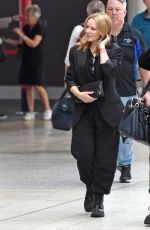 KYLIE MINOGUE Arrives Back in Melbourne 02/26/2023