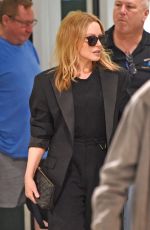 KYLIE MINOGUE Arrives Back in Melbourne 02/26/2023