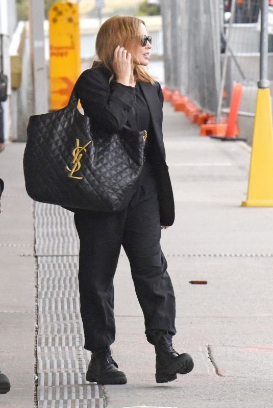 KYLIE MINOGUE Arrives Back in Melbourne 02/26/2023