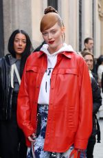 LARSEN THOMPSON Arrives at Ferrari Fashion Show at MFW in Milan 02/25/2023
