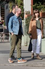 LILY COLLINS and Charlie McDowell at All Time Restaurant in Los Angeles 02/17/2023