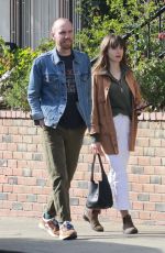 LILY COLLINS and Charlie McDowell at All Time Restaurant in Los Angeles 02/17/2023