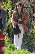 LILY COLLINS and Charlie McDowell at All Time Restaurant in Los Angeles 02/17/2023