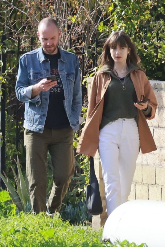 LILY COLLINS and Charlie McDowell at All Time Restaurant in Los Angeles 02/17/2023
