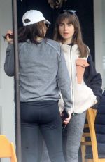 LILY COLLINS and Oliver Cooper Out for Lunch with Friends in Beverly Hills 02/18/2023