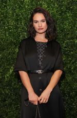 LILY JAMES at Charles Finch & Chanel Pre-bafta Party in London 02/18/2023