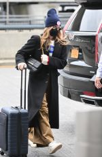 MARGOT ROBBIE Arrives at a New York Airport 02/11/2023