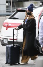 MARGOT ROBBIE Arrives at a New York Airport 02/11/2023