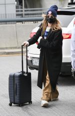 MARGOT ROBBIE Arrives at a New York Airport 02/11/2023