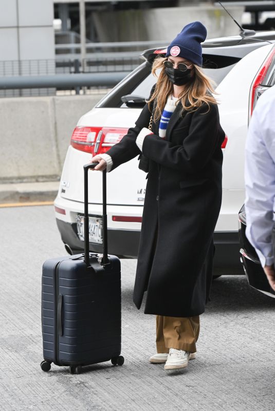 MARGOT ROBBIE Arrives at a New York Airport 02/11/2023