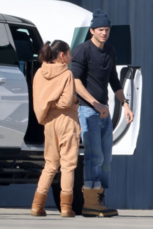 MILA KUNIS and Ashton Kutcher Returning from a Ski Trip in Los Angeles 02/21/2023