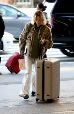 MILLY ALCOCK at a London Airport 01/16/2023