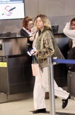 MILLY ALCOCK at a London Airport 01/16/2023