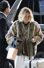 MILLY ALCOCK at a London Airport 01/16/2023