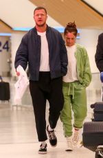 MINKA KELLY and Dan Reynolds at LAX Airport in Los Angeles 02/18/2023