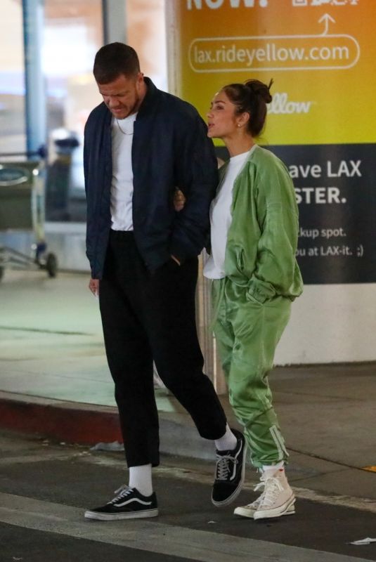 MINKA KELLY and Dan Reynolds at LAX Airport in Los Angeles 02/18/2023