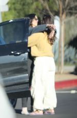 MINKA KELLY Picking Up Her Dog from a Friend