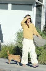 MINKA KELLY Picking Up Her Dog from a Friend