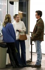 OLIVIA WILDE Chatting with Close Friends at E Baldi Restaurant in Beverly Hills 02/01/2023
