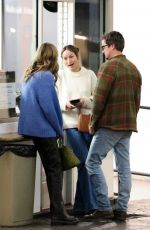OLIVIA WILDE Chatting with Close Friends at E Baldi Restaurant in Beverly Hills 02/01/2023