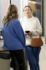 OLIVIA WILDE Chatting with Close Friends at E Baldi Restaurant in Beverly Hills 02/01/2023