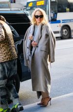 PAMELA ANDERSON Leaves Her Hotel with in New York 02/03/2022