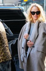 PAMELA ANDERSON Leaves Her Hotel with in New York 02/03/2022