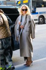 PAMELA ANDERSON Leaves Her Hotel with in New York 02/03/2022