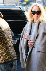 PAMELA ANDERSON Leaves Her Hotel with in New York 02/03/2022