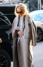 PAMELA ANDERSON Leaves Her Hotel with in New York 02/03/2022