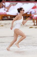 PIPPA MIDDLETON in Swimsuit at a Beach in St. Barts 02/12/2023