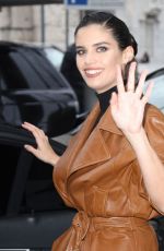 SARA SAMPAIO in a Brown Leather Trench Coat Out at Milan Fashion Week 02/22/2023