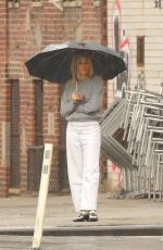 SIENNA MILLER Out on a Rainy Day in New York 02/16/2023