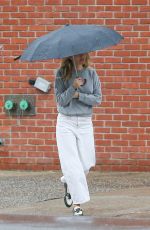 SIENNA MILLER Out on a Rainy Day in New York 02/16/2023