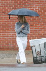 SIENNA MILLER Out on a Rainy Day in New York 02/16/2023