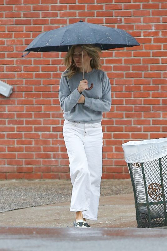 SIENNA MILLER Out on a Rainy Day in New York 02/16/2023