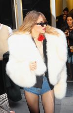 SUKI WATERHOUSE Leaves Empire State Building in New York 02/27/2023