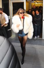 SUKI WATERHOUSE Leaves Empire State Building in New York 02/27/2023