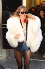 SUKI WATERHOUSE Leaves Empire State Building in New York 02/27/2023