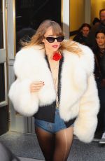 SUKI WATERHOUSE Leaves Empire State Building in New York 02/27/2023