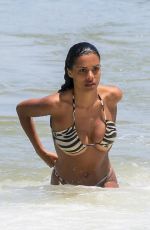 TINA KUNAKEY in Bikini at a Beach with Friends in Rio de Janeiro 02/11/2023
