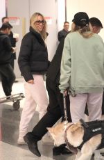 TISH and BRANDY CYRUS with Their Service Dog Arrives in Los Angeles 02/03/2023
