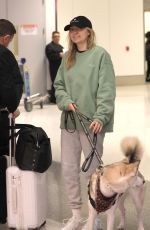 TISH and BRANDY CYRUS with Their Service Dog Arrives in Los Angeles 02/03/2023