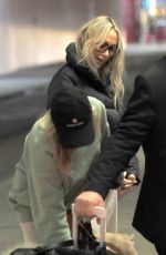 TISH and BRANDY CYRUS with Their Service Dog Arrives in Los Angeles 02/03/2023