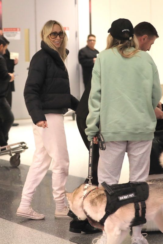 TISH and BRANDY CYRUS with Their Service Dog Arrives in Los Angeles 02/03/2023