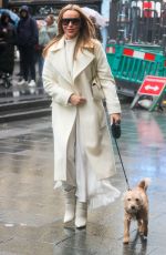 AMANDA HOLDEN Leaves Heart Radio with Her Dog Rudie in London 03/17/2023