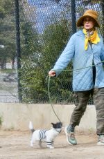 ANDIE MACDOWELL Out with Her Dog at Silverlake Reservoir Walking Trails 03/05/2023