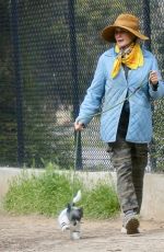 ANDIE MACDOWELL Out with Her Dog at Silverlake Reservoir Walking Trails 03/05/2023