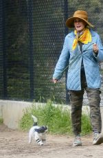 ANDIE MACDOWELL Out with Her Dog at Silverlake Reservoir Walking Trails 03/05/2023